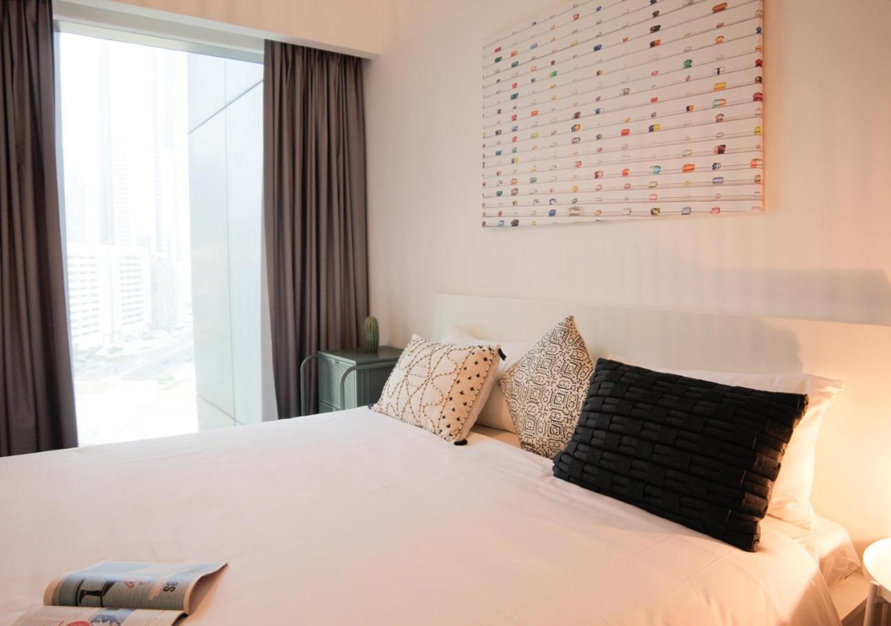 Nasma Luxury Stays - Central Park Tower Dubai Esterno foto